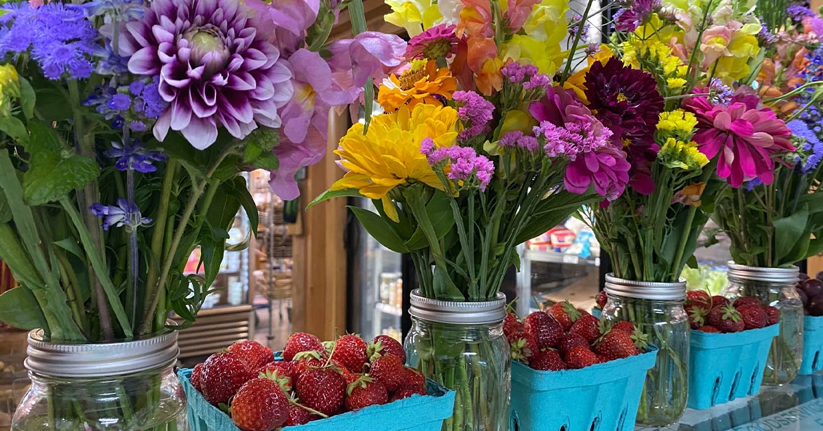 flower displays and strawberries
